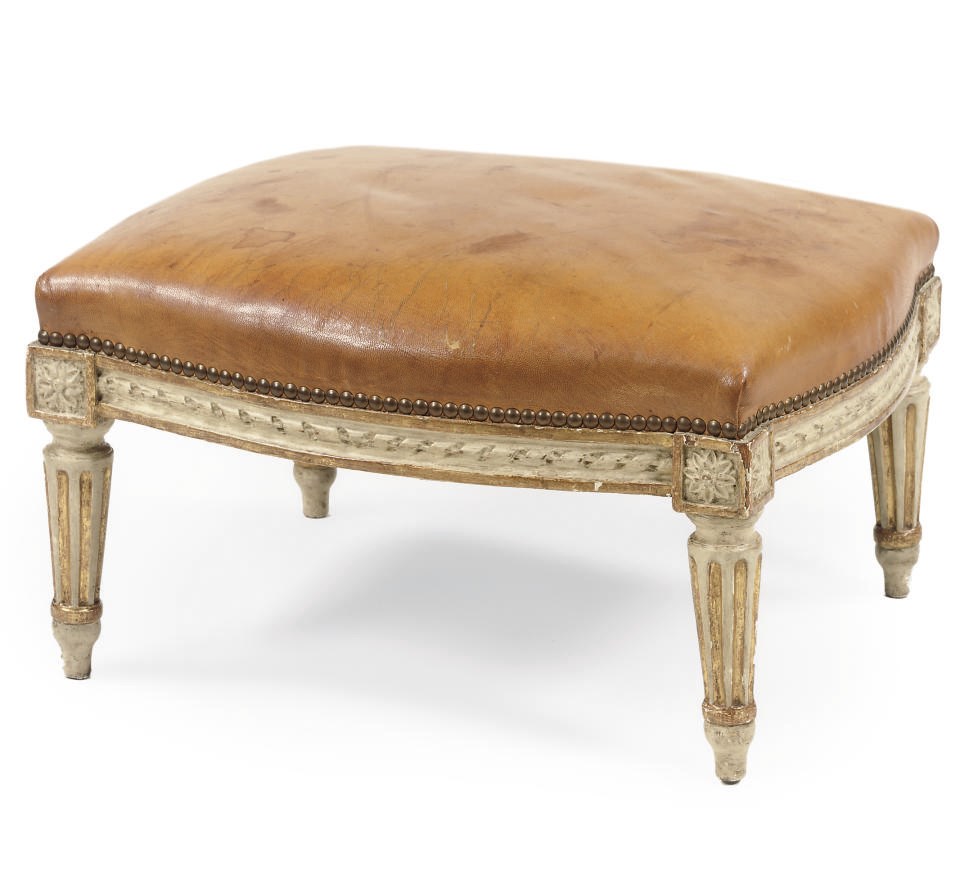 A LOUIS XVI PARCEL-GILT AND CREME PAINTED FOOT-REST