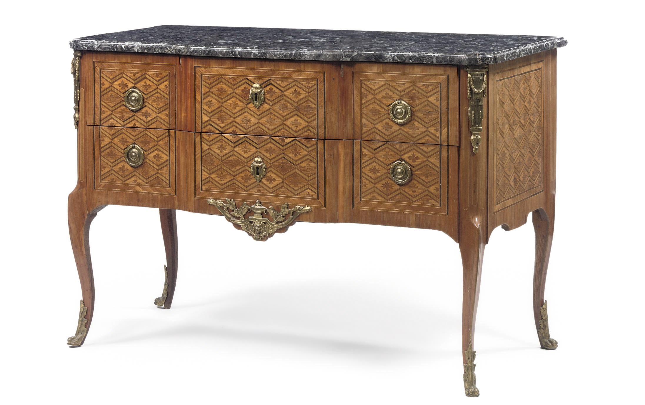 A LATE LOUIS XV ORMOLU-MOUNTED TULIPWOOD, AMARANTH, STAINED FRUITWOOD AND FRUITWOOD PARQUETRY COMMODE