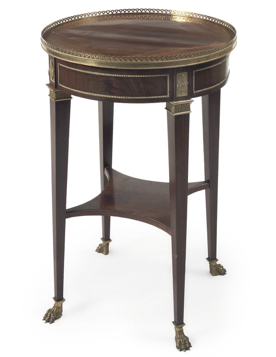 AN AUSTRIAN ORMOLU-MOUNTED MAHOGANY OCCASIONAL TABLE