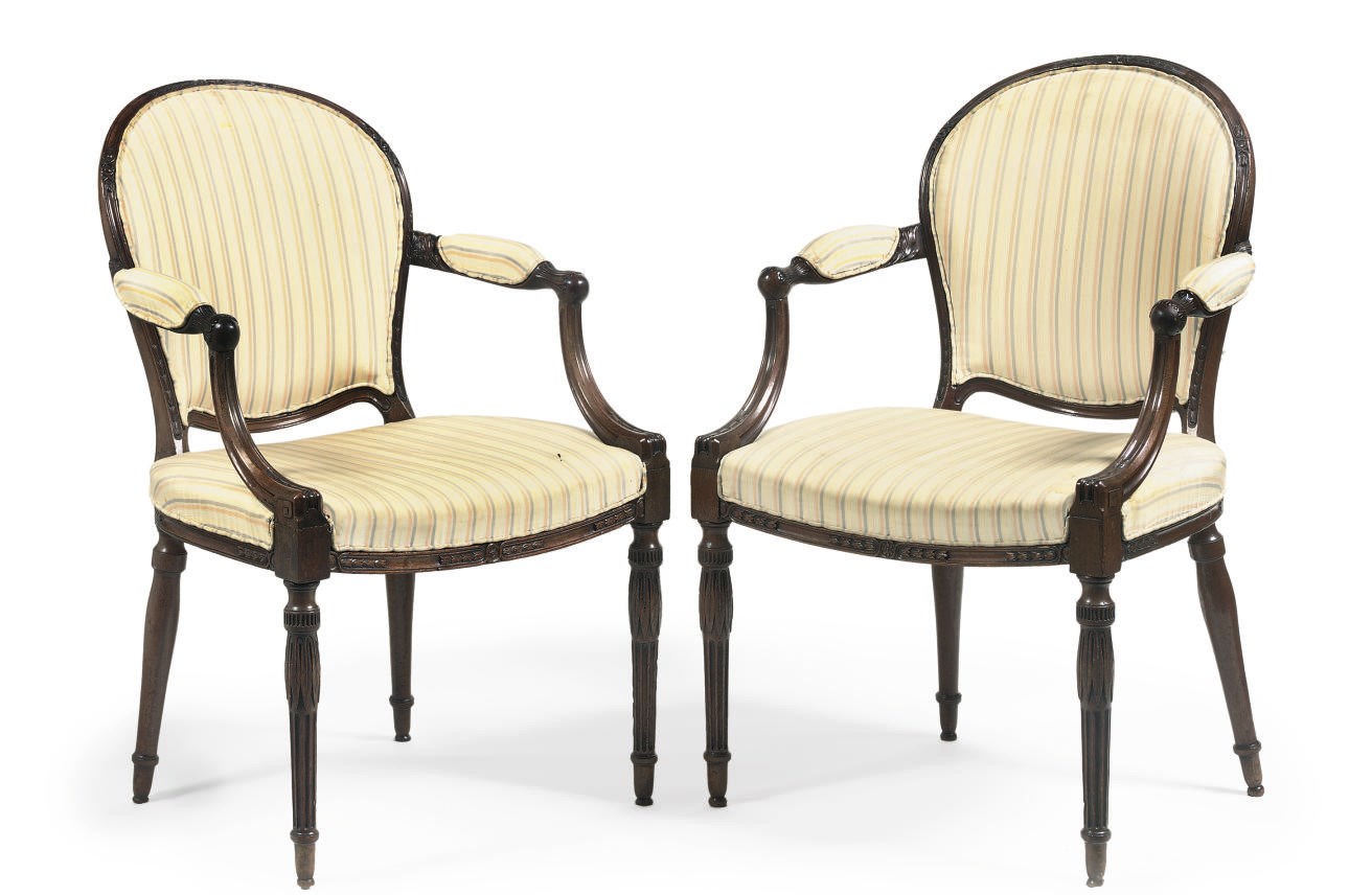 A PAIR OF GEORGE III MAHOGANY OPEN ARMCHAIRS