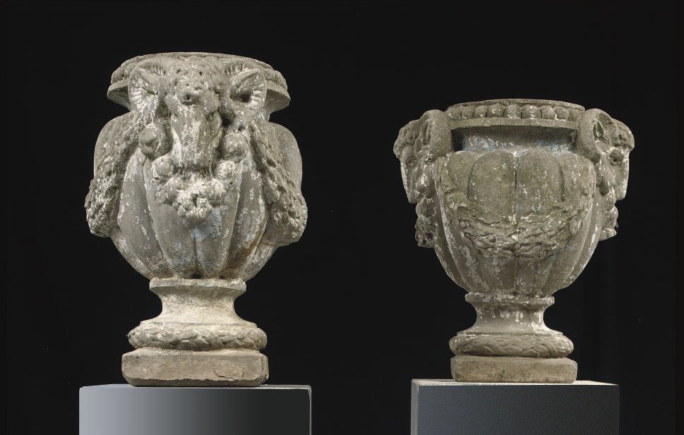 A PAIR OF NORTH EUROPEAN COMPOSITE STONE CAMPANA VASES