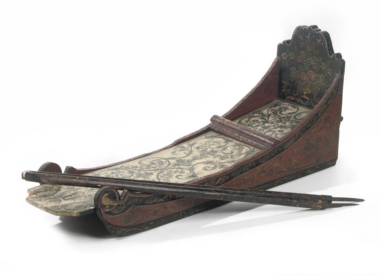 A DUTCH POLYCHROME DECORATED AND CARVED WOOD SLEDGE 'PRIKSLEE'