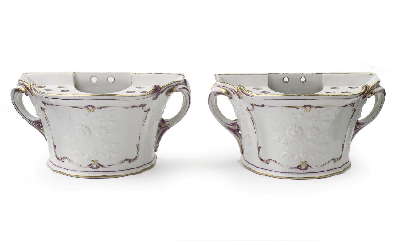 A pair of Loosdrecht demi lune wall pique-fleurs