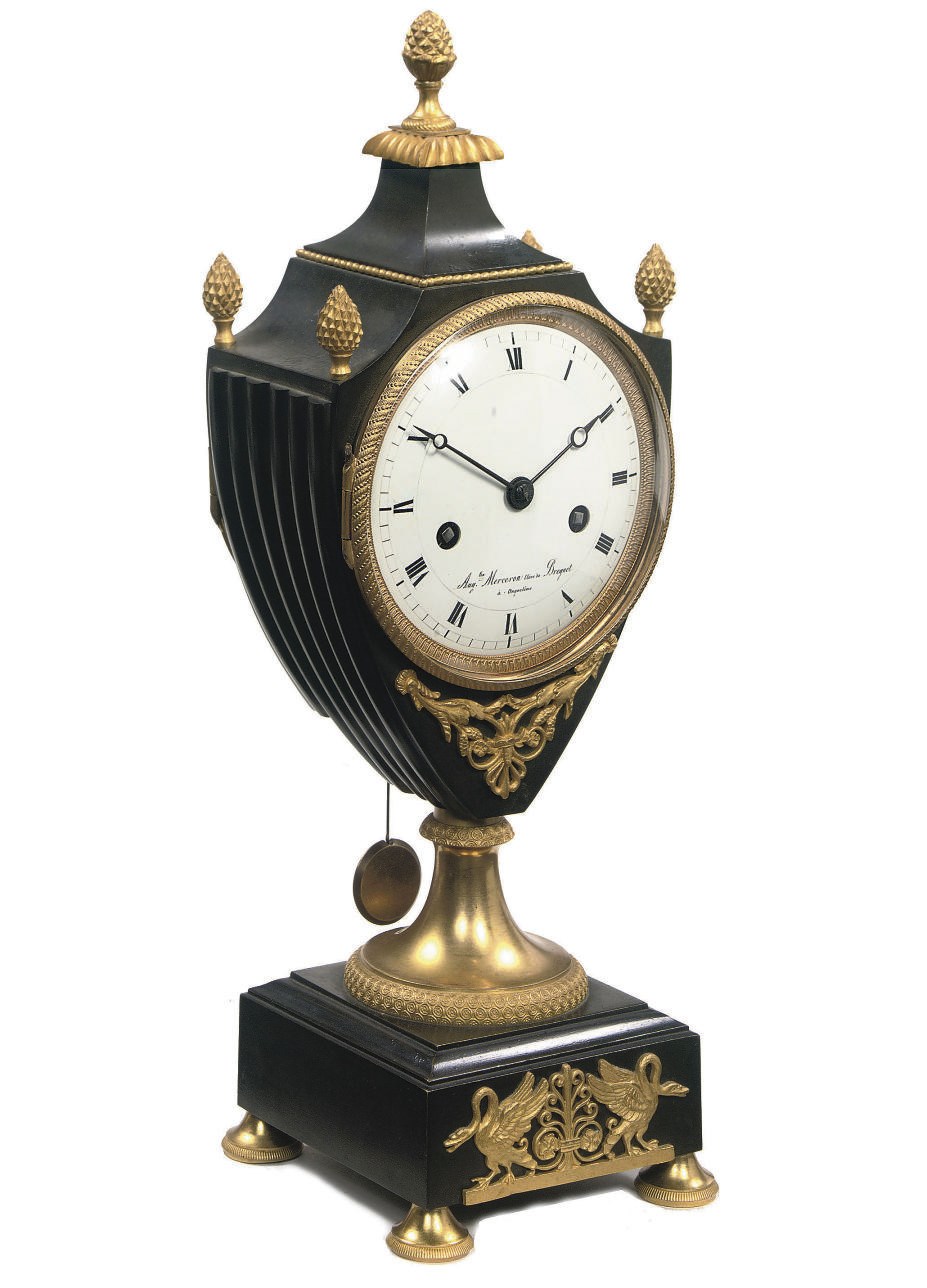 A RESTAURATION ORMOLU MOUNTED GREEN-PATINATED BRONZE STRIKING MANTEL CLOCK