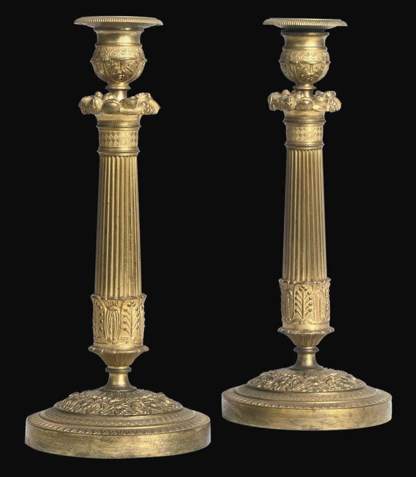 A PAIR OF RESTAURATION ORMOLU CANDLESTICKS
