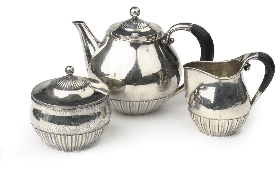 A Danish hammered silver three-piece tea-service
