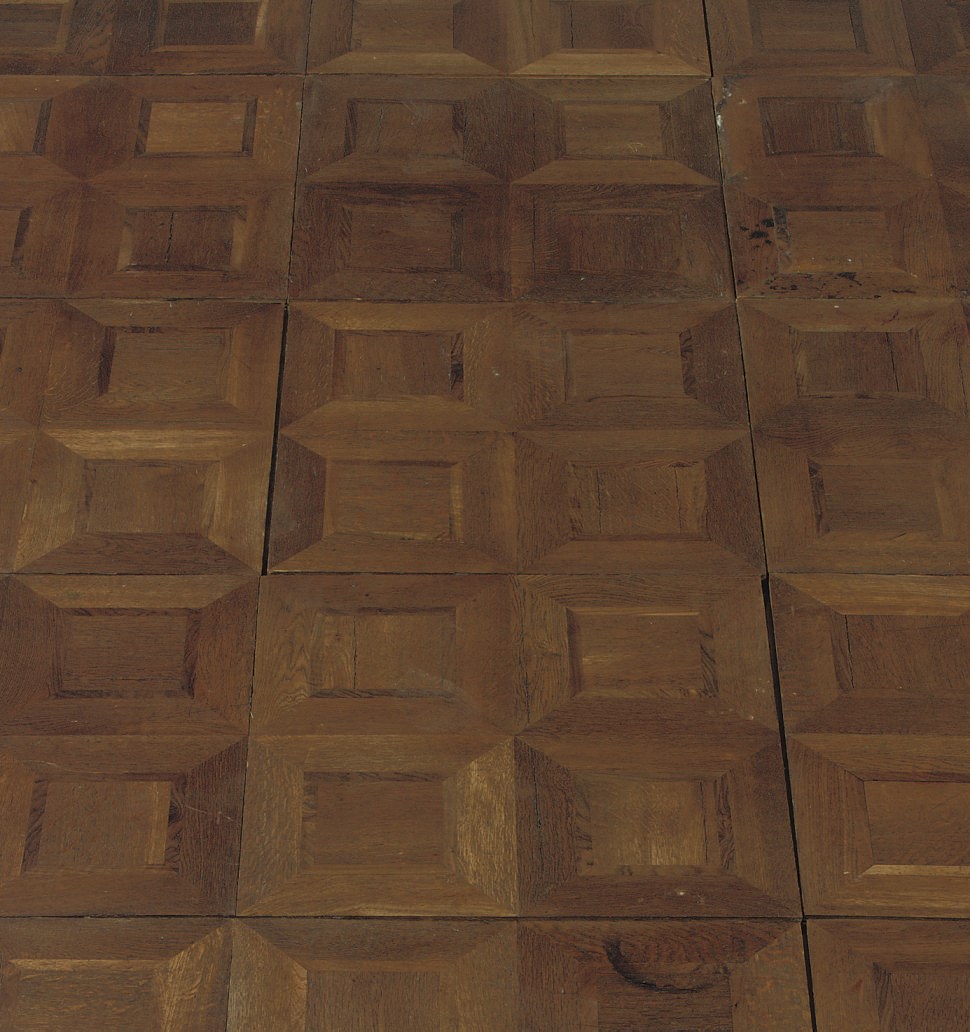 AN AUSTRIAN OAK, BOG-OAK, AND WALNUT INLAID PARQUET FLOOR