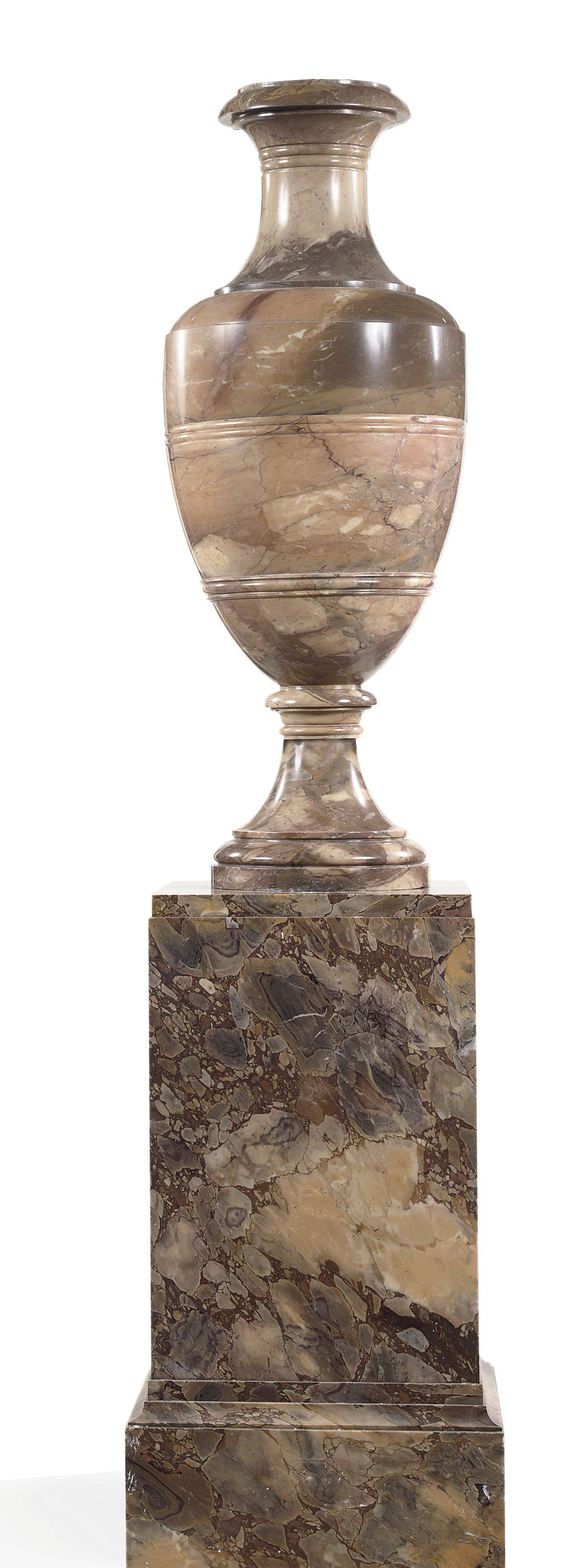 A MASSIVE NORTH EUROPEAN VARIEGATED BEIGE AND BROWN MARBLE VASE