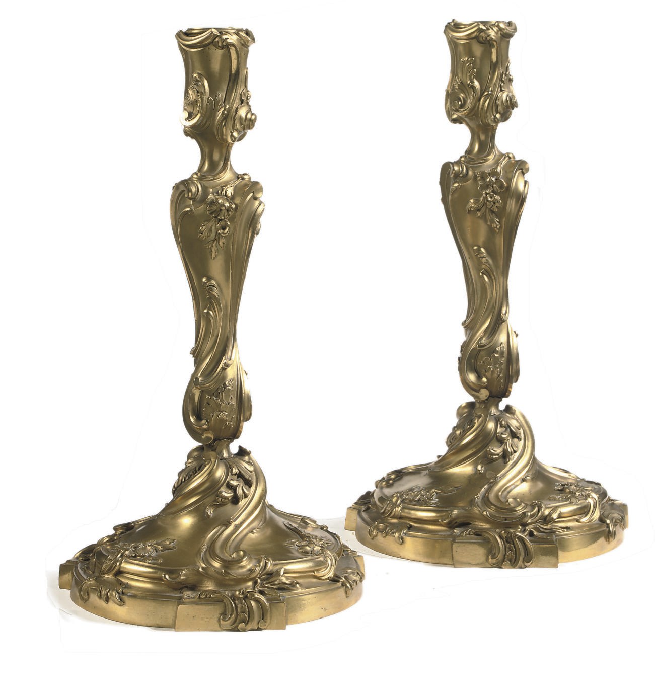 A PAIR OF FRENCH ORMOLU CANDLESTICKS