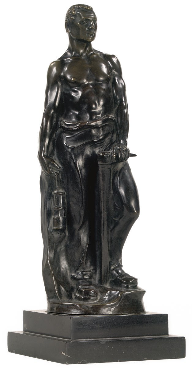 A BRONZE FIGURE OF A MINE WORKER