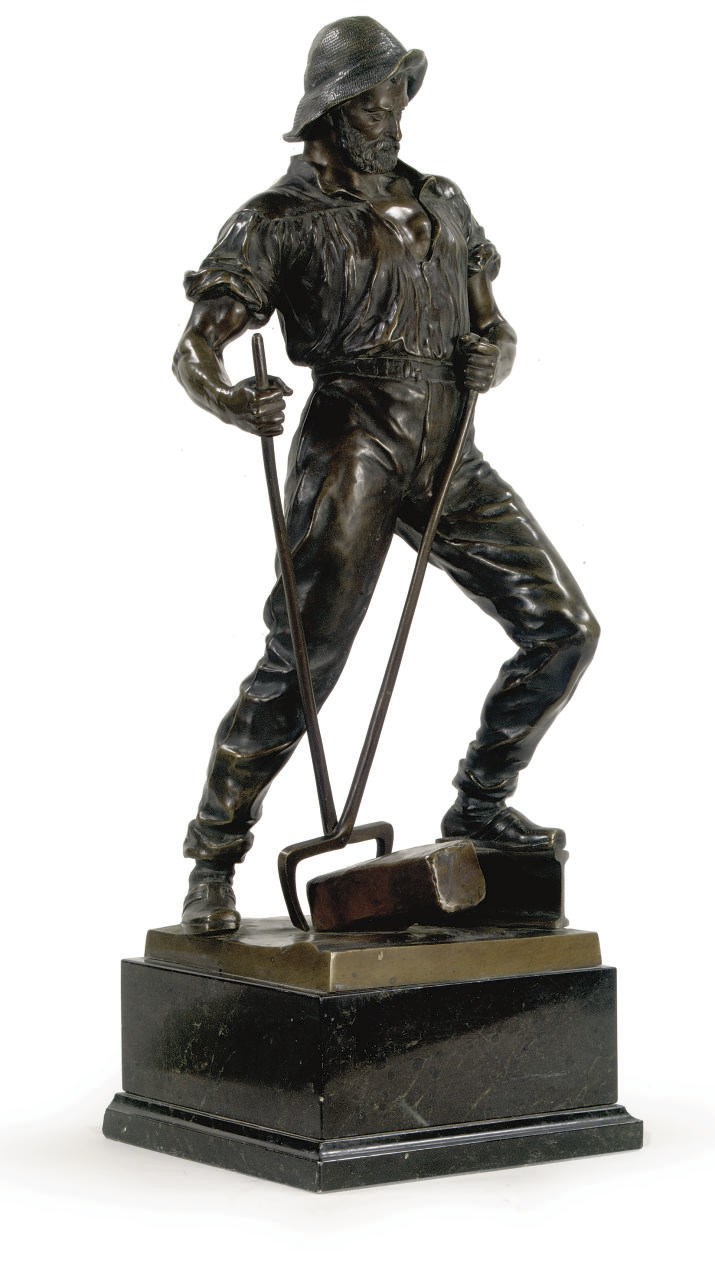 A BRONZE FIGURE OF A QUARRY WORKER