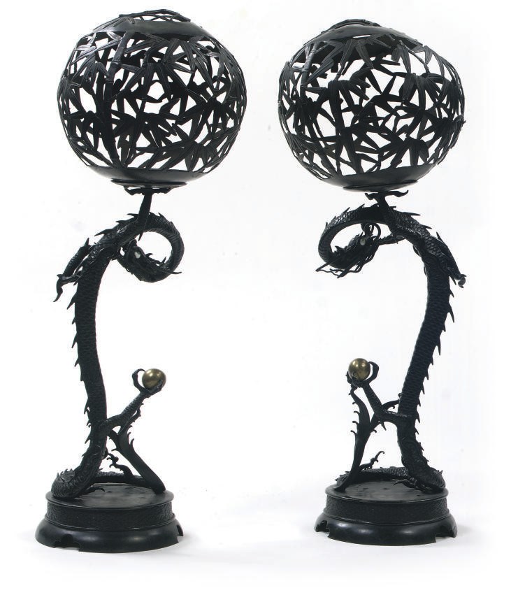 A pair of Chinese bronze candleholders