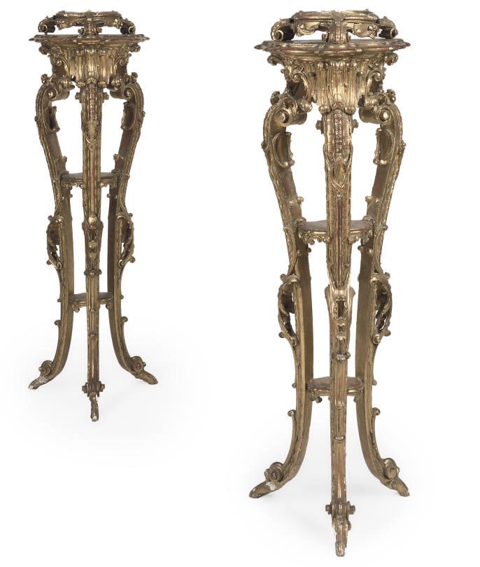 A PAIR OF NORTH EUROPEAN GILTWOOD TORCHERES