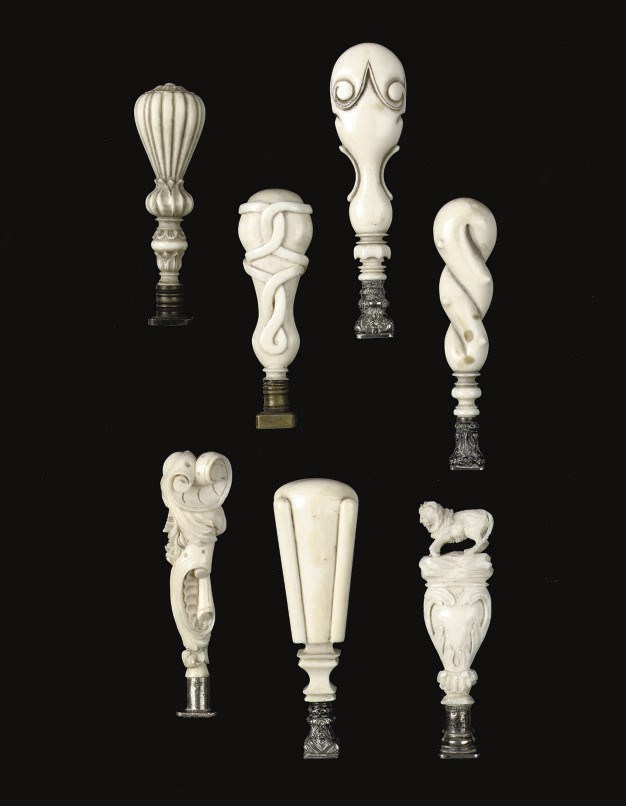 SEVEN VARIOUS CARVED IVORY SEALS