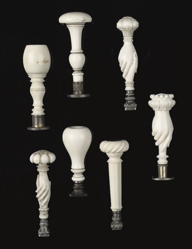 SEVEN CARVED IVORY SEALS