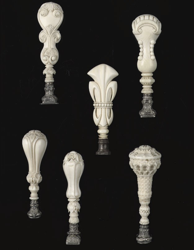 SIX CARVED IVORY SEALS