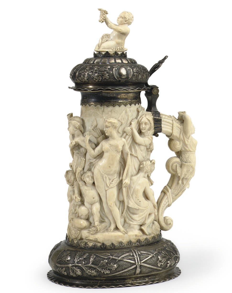 A GERMAN SILVER MOUNTED IVORY TANKARD