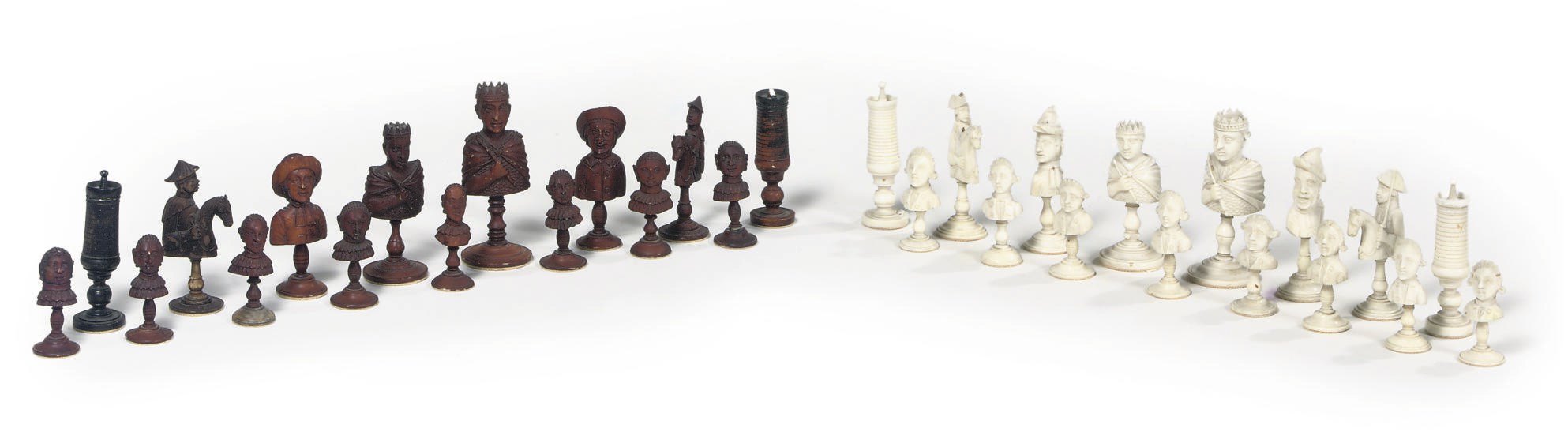 A TURNED IVORY CHESS SET