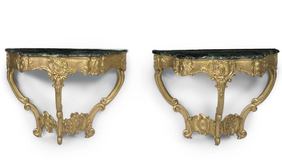 A NEAR PAIR OF GILTWOOD CONSOLE TABLES