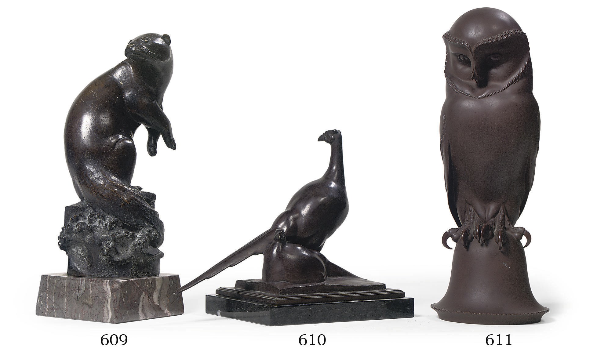 A BRONZE FIGURE OF AN OTTER