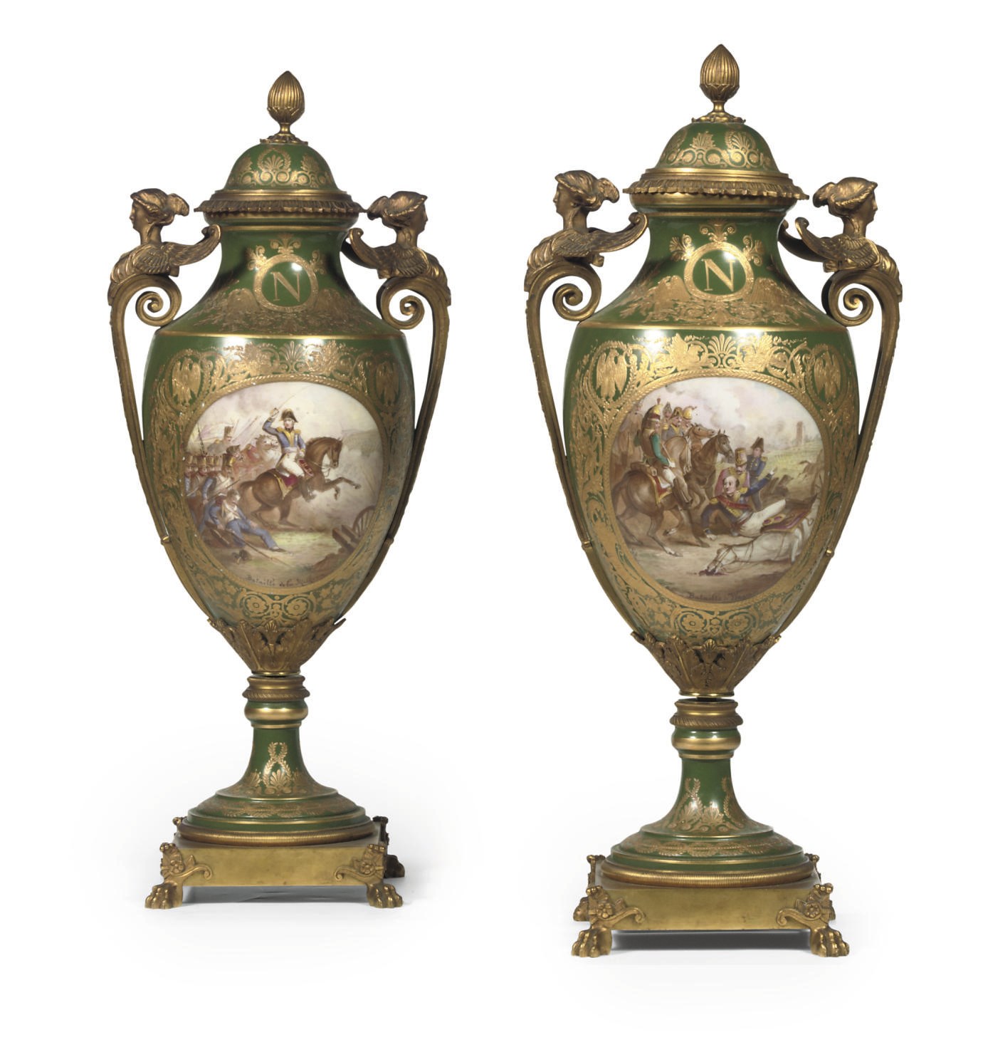 A PAIR OF NAPOLEON III ORMOLU-MOUNTED SEVRES-PATTERN GREEN-GROUND PORCELAIN VASES
