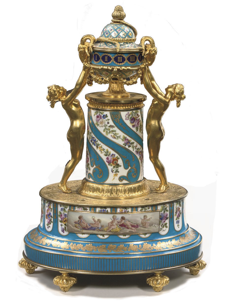 A NAPOLEON III ORMOLU-MOUNTED SEVRES-STYLE PORCELAIN 'PENDULE A CERCLES TOURNANTS'