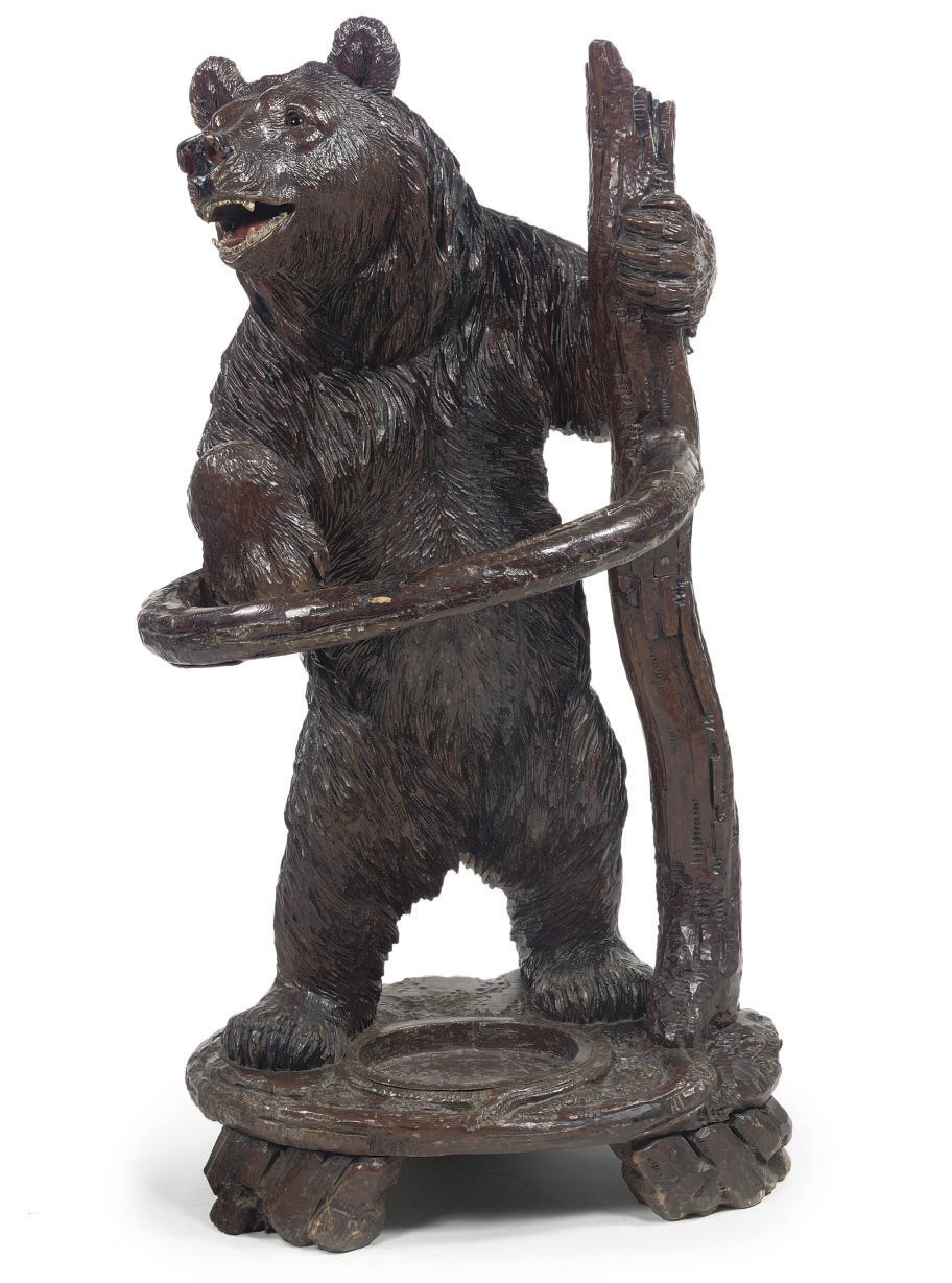 A SWISS CARVED WOOD BEAR UMBRELLA STAND