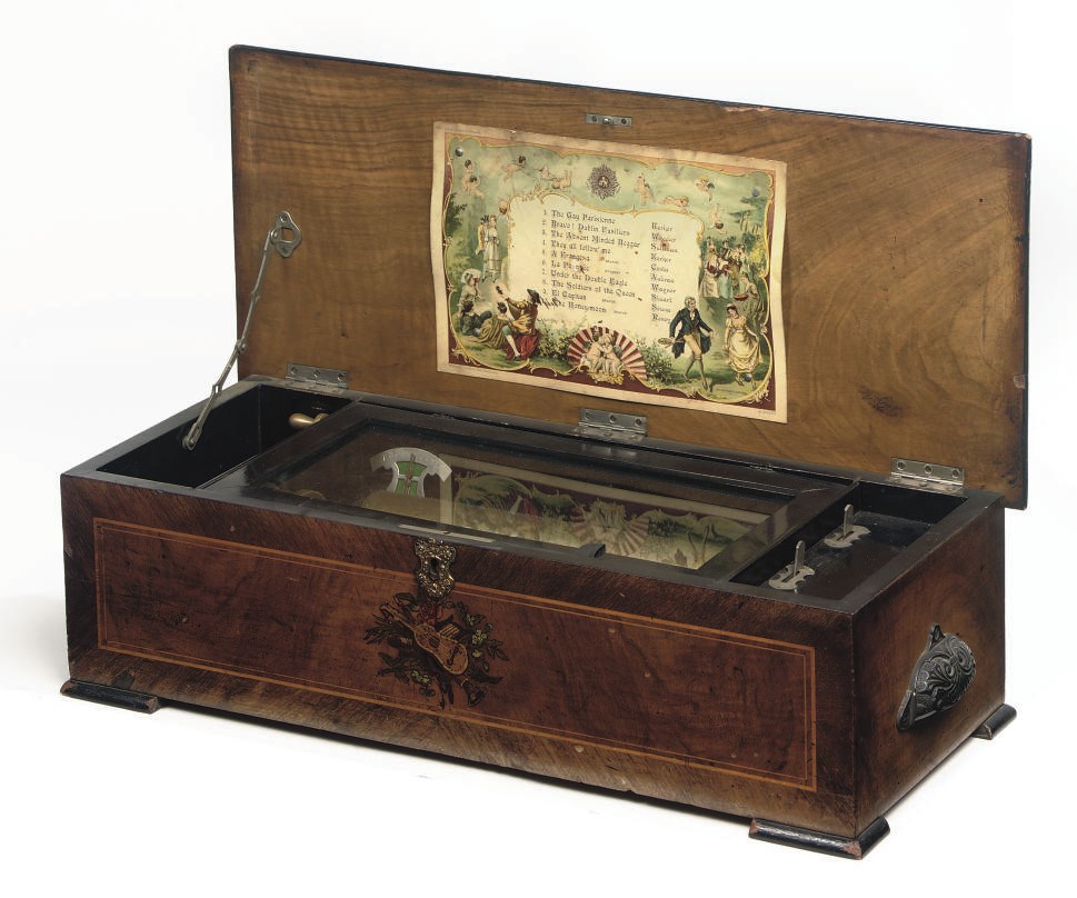 A SWISS ROSEWOOD, WALNUT, FIGURED-WALNUT AND FRUITWOOD LINE INLAID CYLINDER MUSICAL BOX