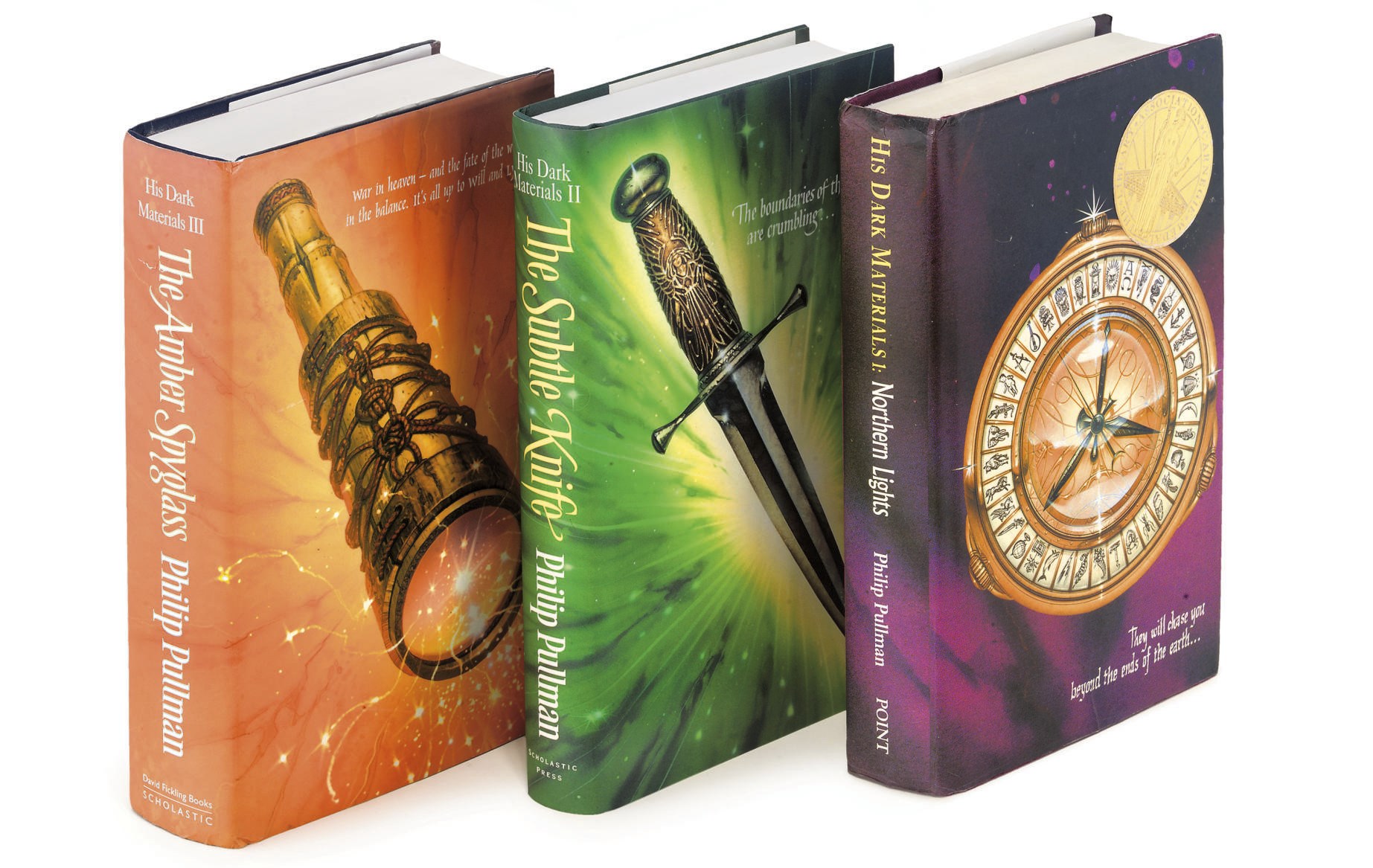 PULLMAN, Philip (b.1946).  His Dark Materials trilogy, comprising: