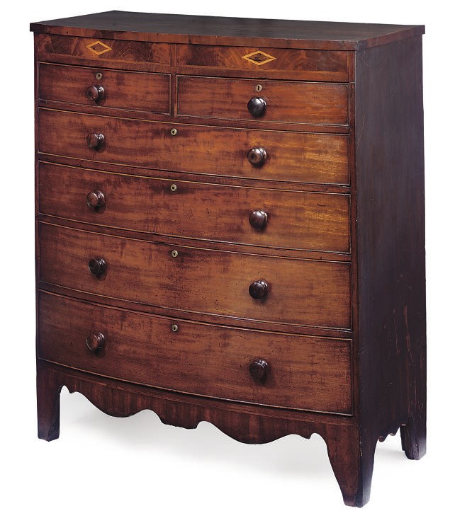 A LATE REGENCY MAHOGANY INLAID BOWFRONT CHEST