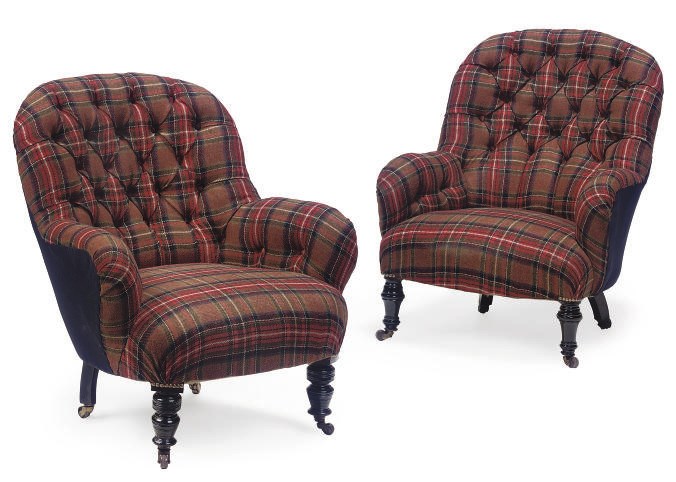A PAIR OF VICTORIAN EBONISED TUB CHAIRS