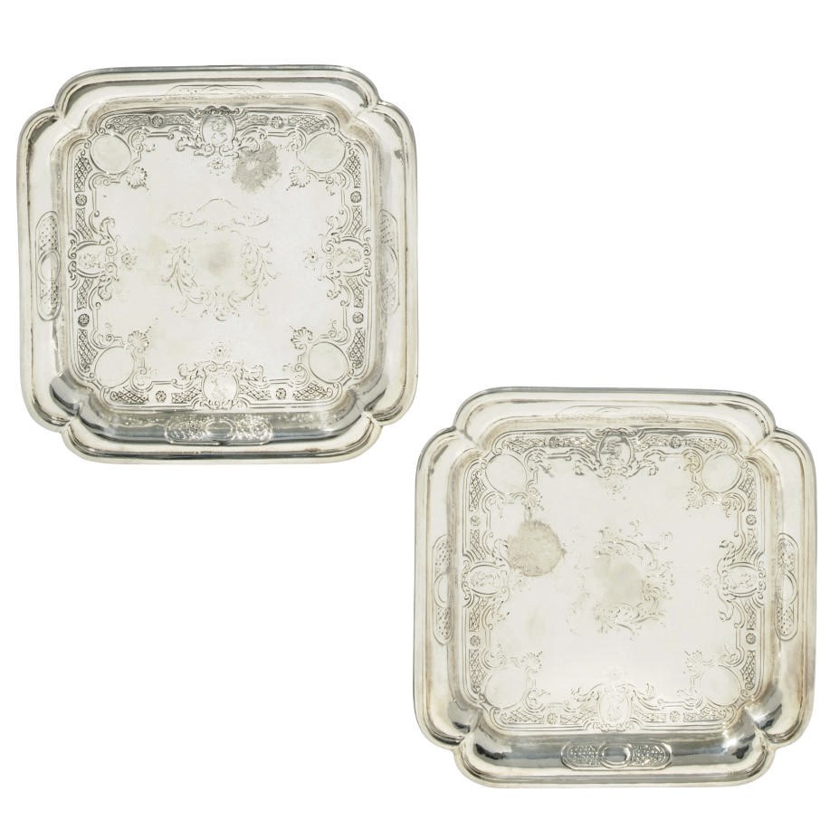 A PAIR OF GEORGE II SHAPED SQUARE SILVER SALVERS