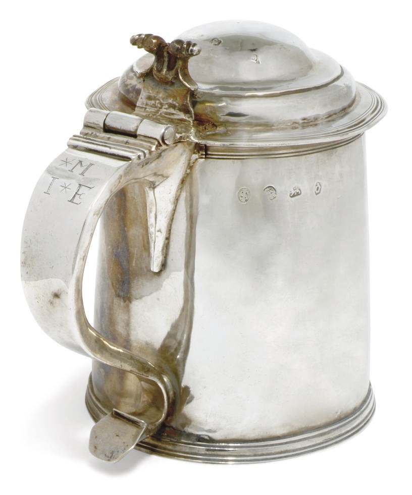 A CHARLES II PLAIN SILVER TANKARD