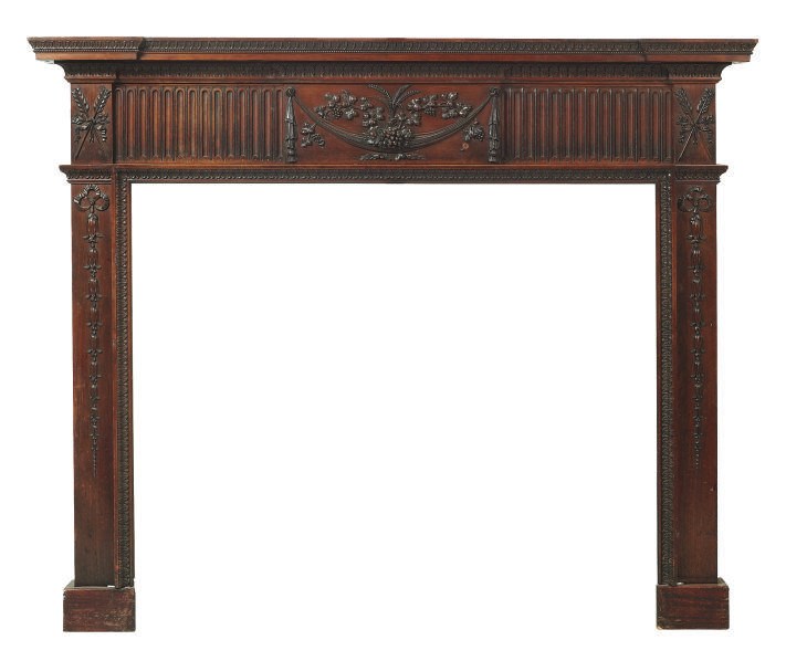 AN IRISH WALNUT CHIMNEYPIECE