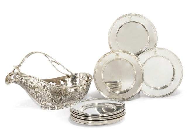 AN ITALIAN METALWARE BOTTLE HOLDER