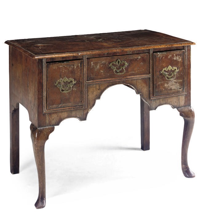 A WALNUT FEATHER CROSSBANDED LOWBOY