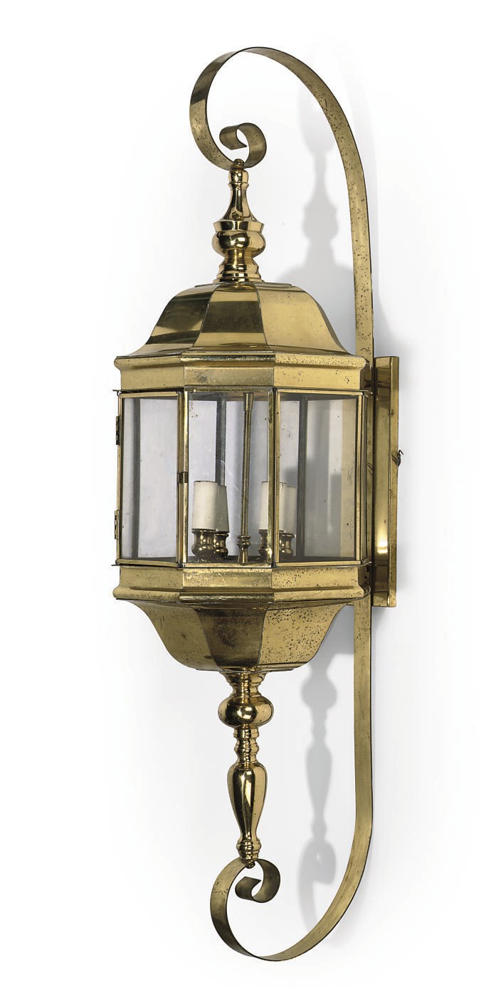 A SET OF FIVE LARGE BRASS WALL LANTERNS