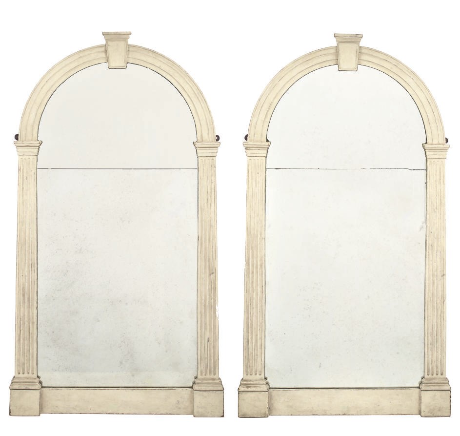 A PAIR OF PAINTED WALL MIRRORS