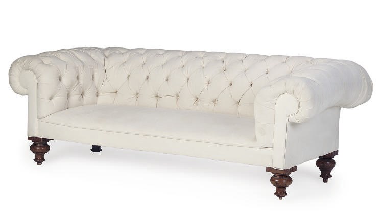 A LATE VICTORIAN WALNUT SOFA