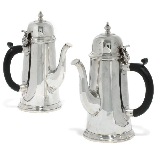 A MATCHED PAIR OF SILVER COFFEE POTS IN THE QUEEN ANNE STYLE
