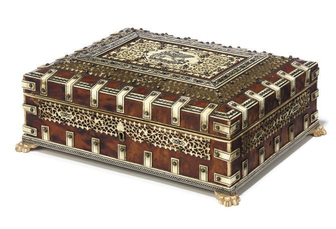 AN INDIAN TORTOISESHELL VENEERED AND IVORY MOUNTED CASKET