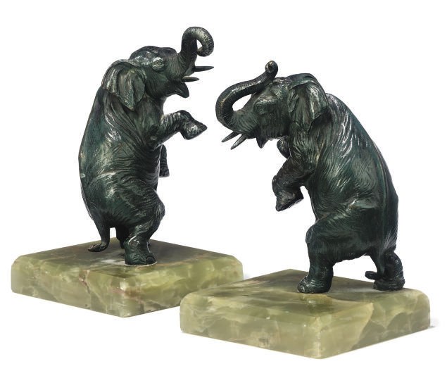 A PAIR OF COLD-PAINTED BRONZE ELEPHANT BOOKENDS