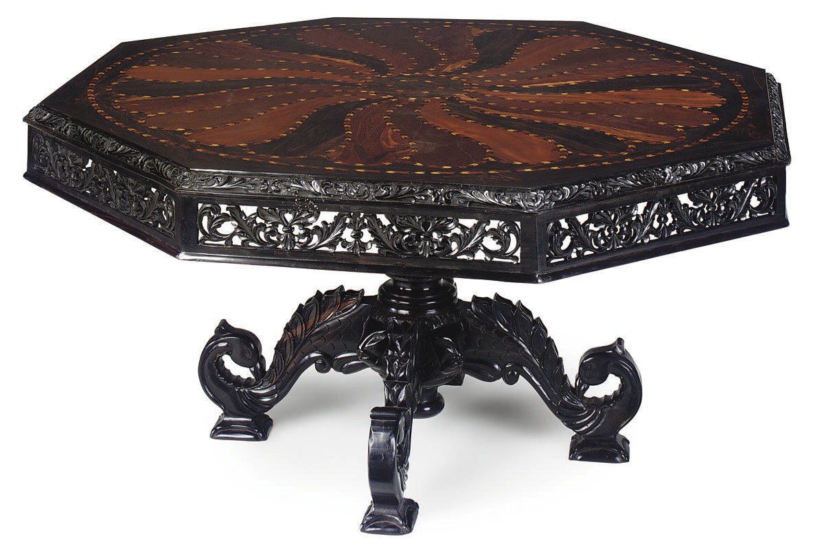 AN ANGLO INDIAN EBONY AND SPECIMEN WOOD OCTAGONAL CENTRE TABLE