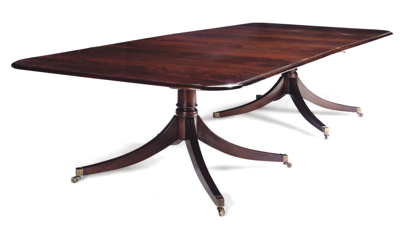 A MAHOGANY TWIN PEDESTAL DINING TABLE