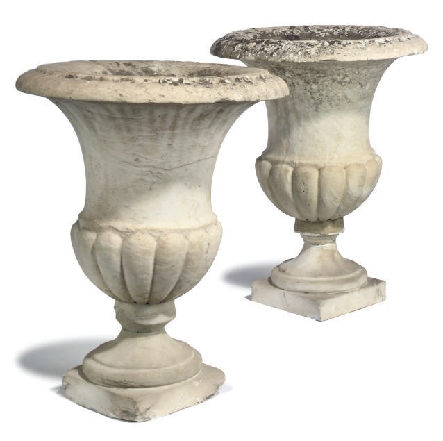 A PAIR OF WHITE MARBLE CAMPANA SHAPED GARDEN URNS