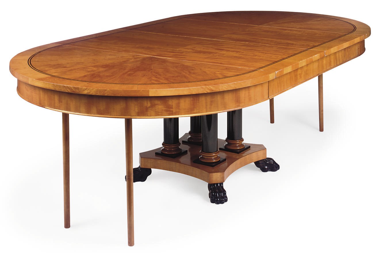 A NORTH EUROPEAN BIRCH AND KARELIAN BIRCH INLAID EXTENDING DINING TABLE