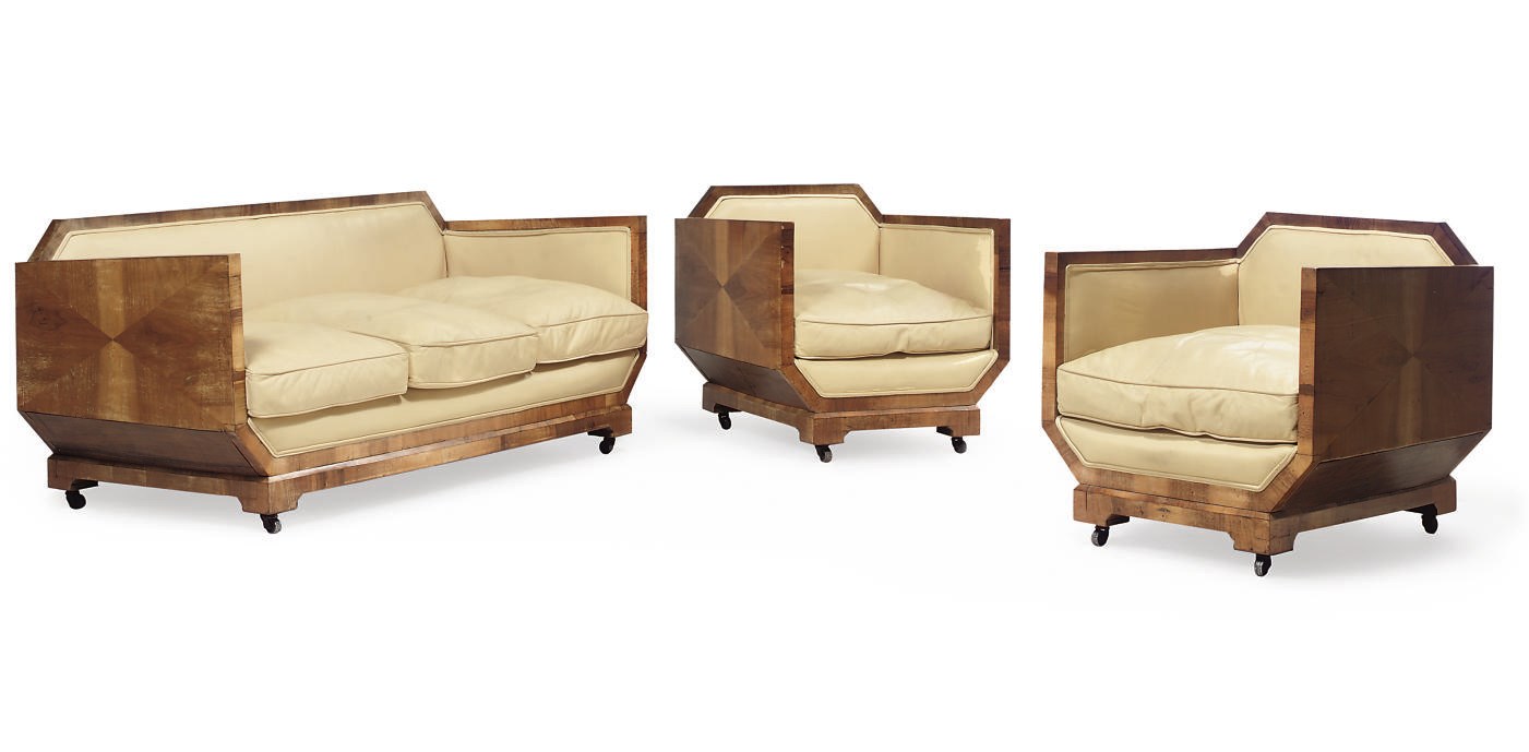 AN ART DECO WALNUT THREE PIECE SOFA SUITE