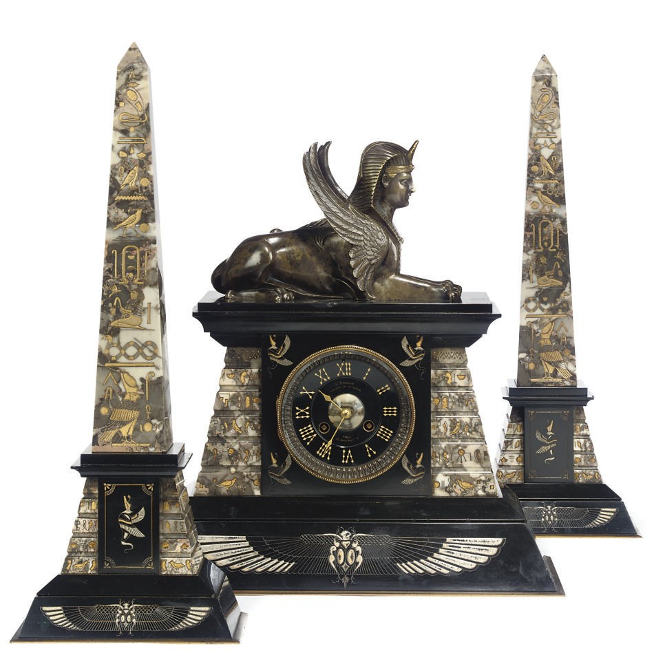 A FRENCH VARIGATED AND BLACK MARBLE MANTEL CLOCK AND GARNITURE
