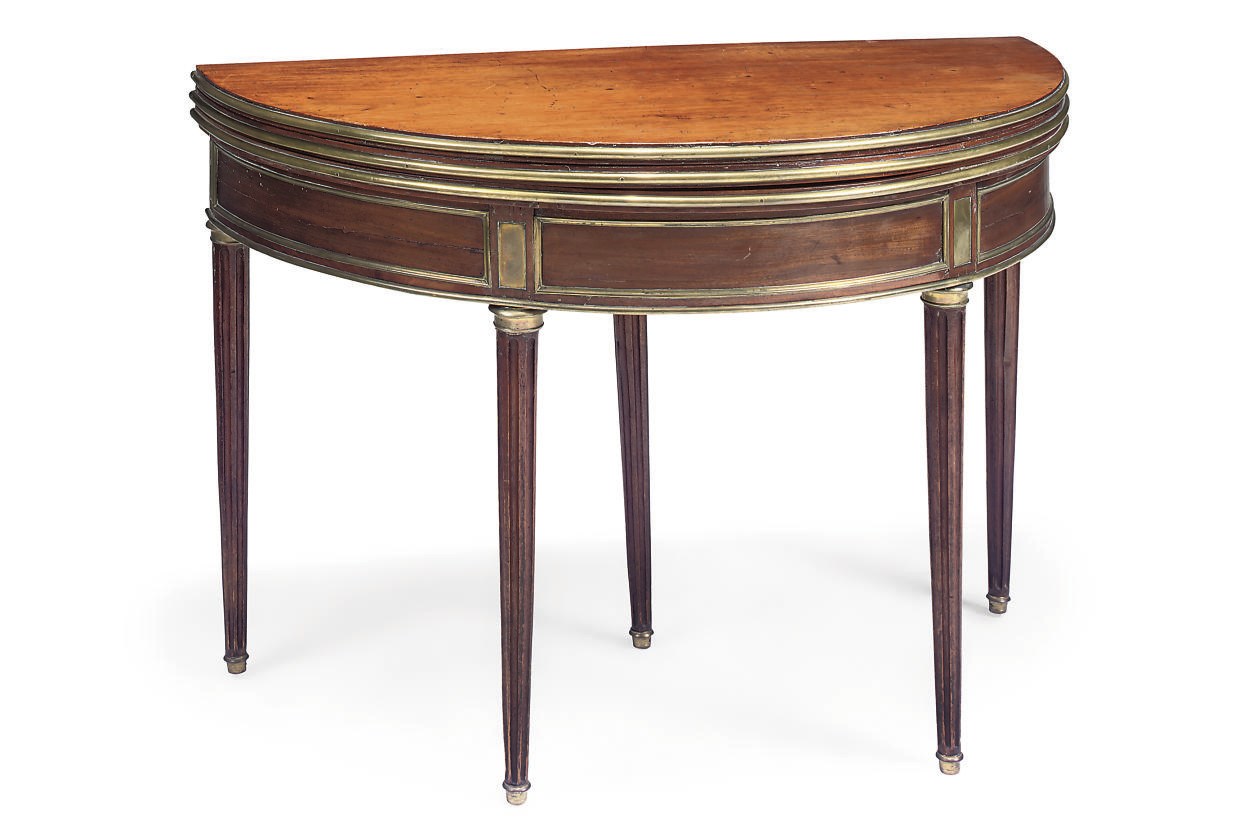 A LOUIS XVI BRASS-MOUNTED MAHOGANY DEMI-LUNE CARD TABLE