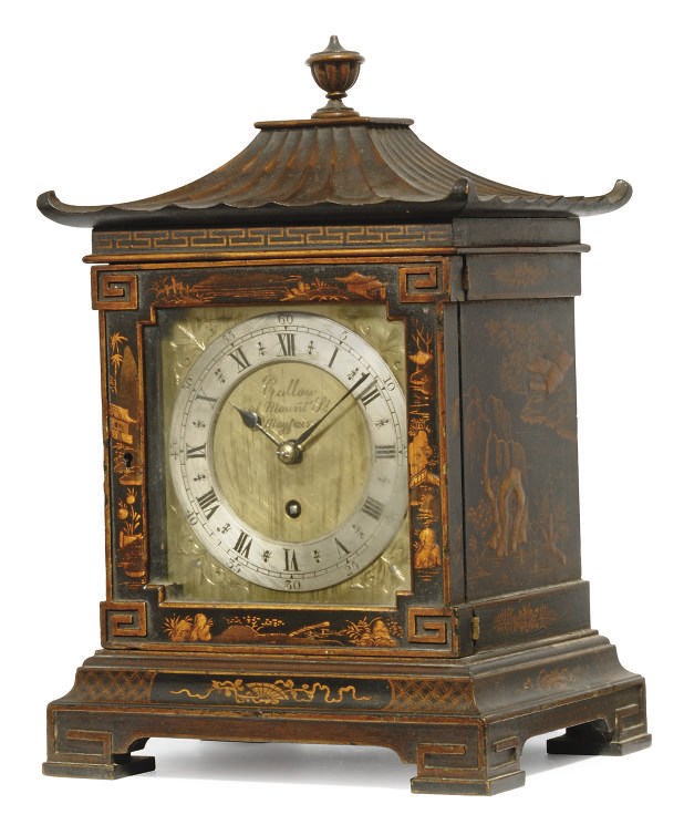 AN EDWARDIAN LACQUER EIGHT-DAY TIMEPIECE TABLE CLOCK